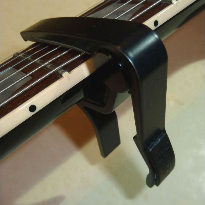 Каподастр Jim Dunlop Trigger Capo Acoustic Curved Maple (83CM) изображение 4