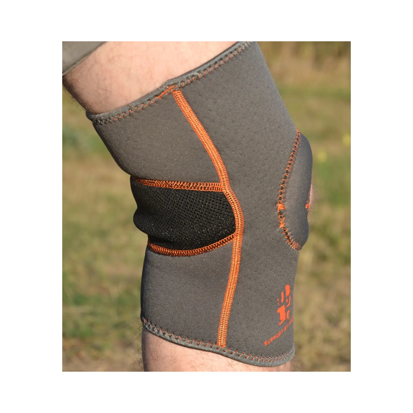 Фиксатор колена MadMax MFA-297 Knee Support with Patella Stabilizer Dark Grey/Orange L (MFA-297_L) изображение 4