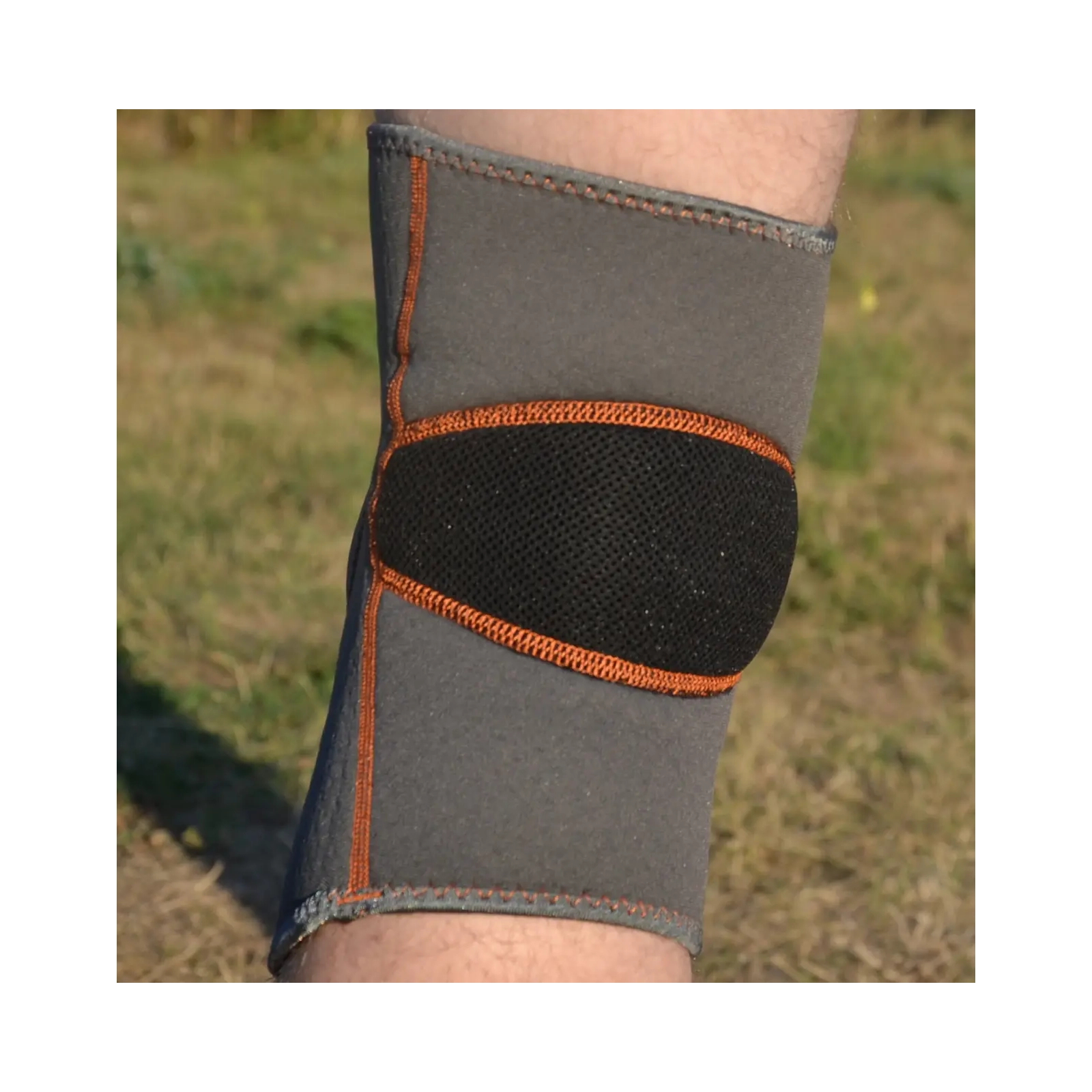 Фіксатор коліна MadMax MFA-297 Knee Support with Patella Stabilizer Dark Grey/Orange M (MFA-297_M) зображення 7