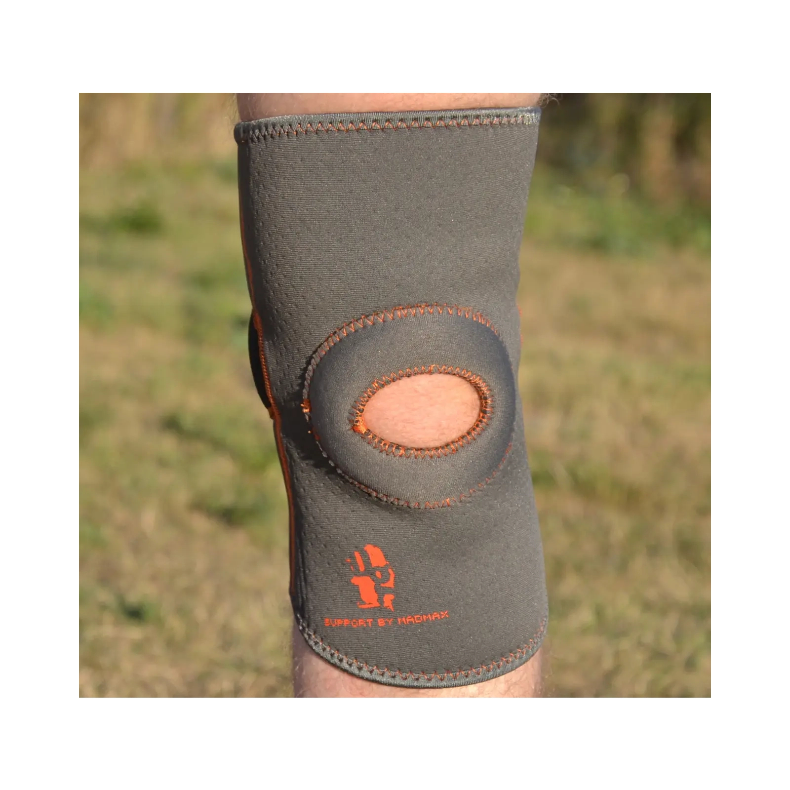 Фиксатор колена MadMax MFA-297 Knee Support with Patella Stabilizer Dark Grey/Orange M (MFA-297_M) изображение 5