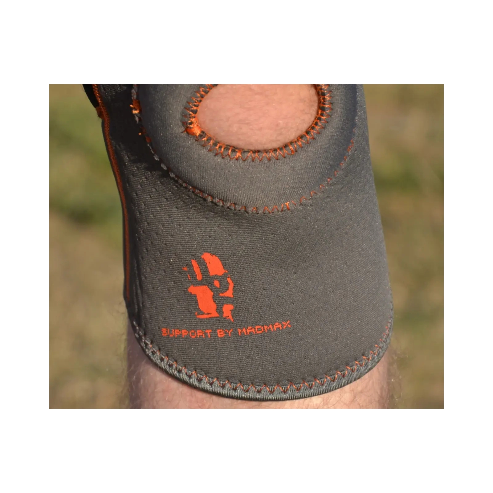 Фиксатор колена MadMax MFA-297 Knee Support with Patella Stabilizer Dark Grey/Orange M (MFA-297_M) изображение 8