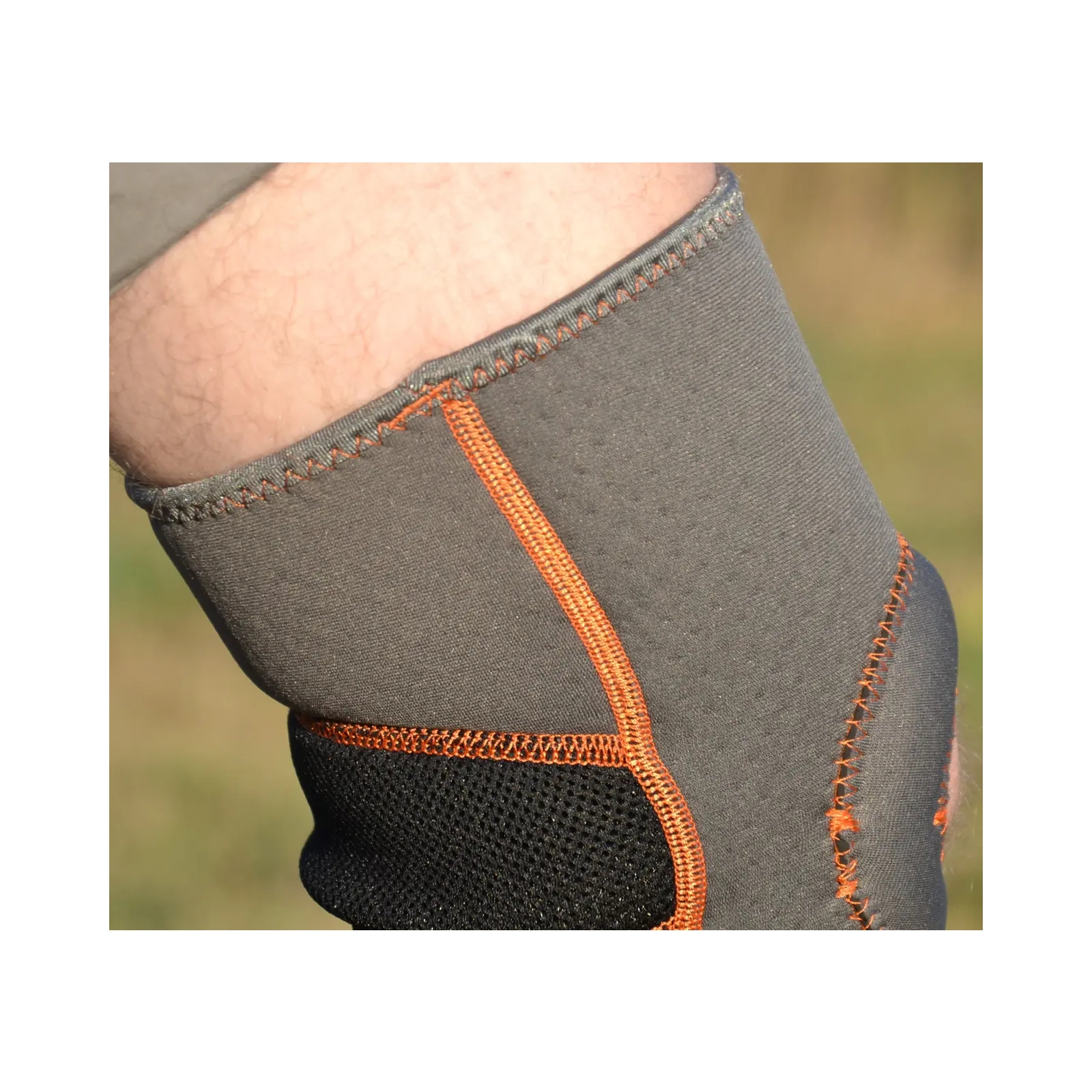 Фиксатор колена MadMax MFA-297 Knee Support with Patella Stabilizer Dark Grey/Orange L (MFA-297_L) изображение 8