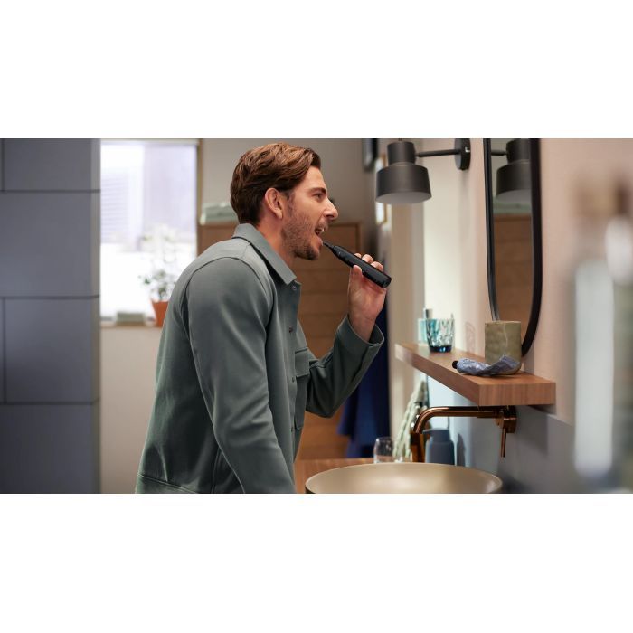 Електрична зубна щітка Philips HX7111/01 зображення 11