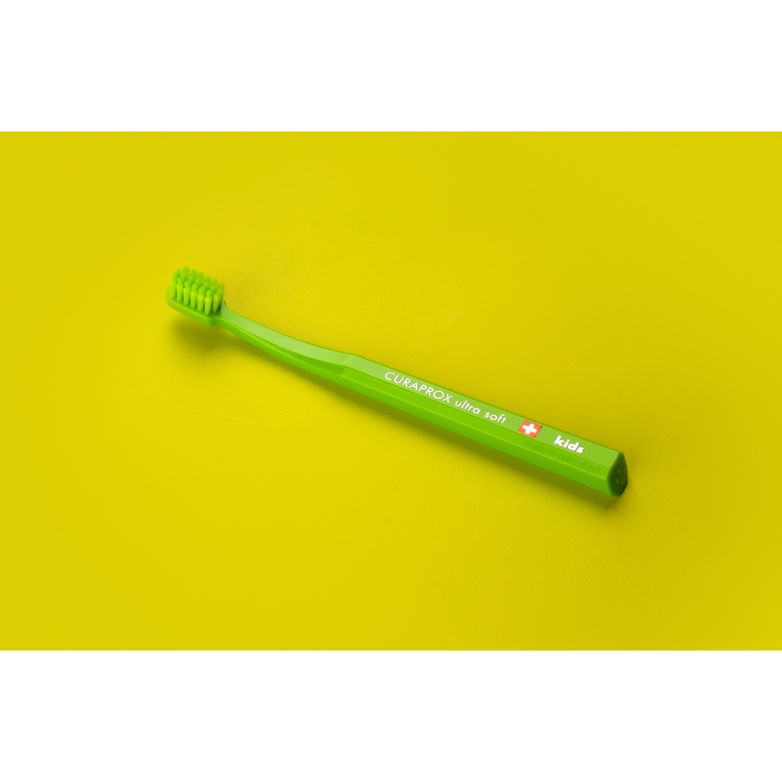 Дитяча зубна щітка Curaprox CS Kids ультрам'яка d 0.09 мм (4-12 років) Помаранчеви (CS Kids-03) зображення 2