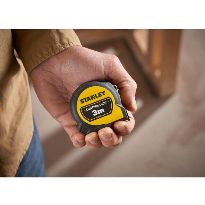 Рулетка Stanley CONTROL-LOCK, 3мх19мм, у прогумованому корпусі, з двосторонньою шкалою (STHT37230-0) зображення 12