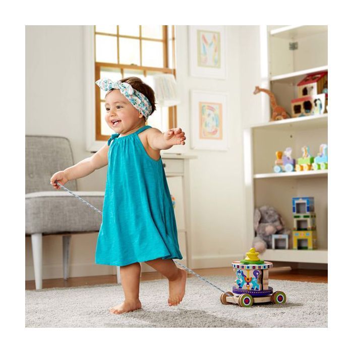 Розвиваюча іграшка Melissa&Doug Перша дерев'яна іграшка Карусель (MD13616) зображення 6