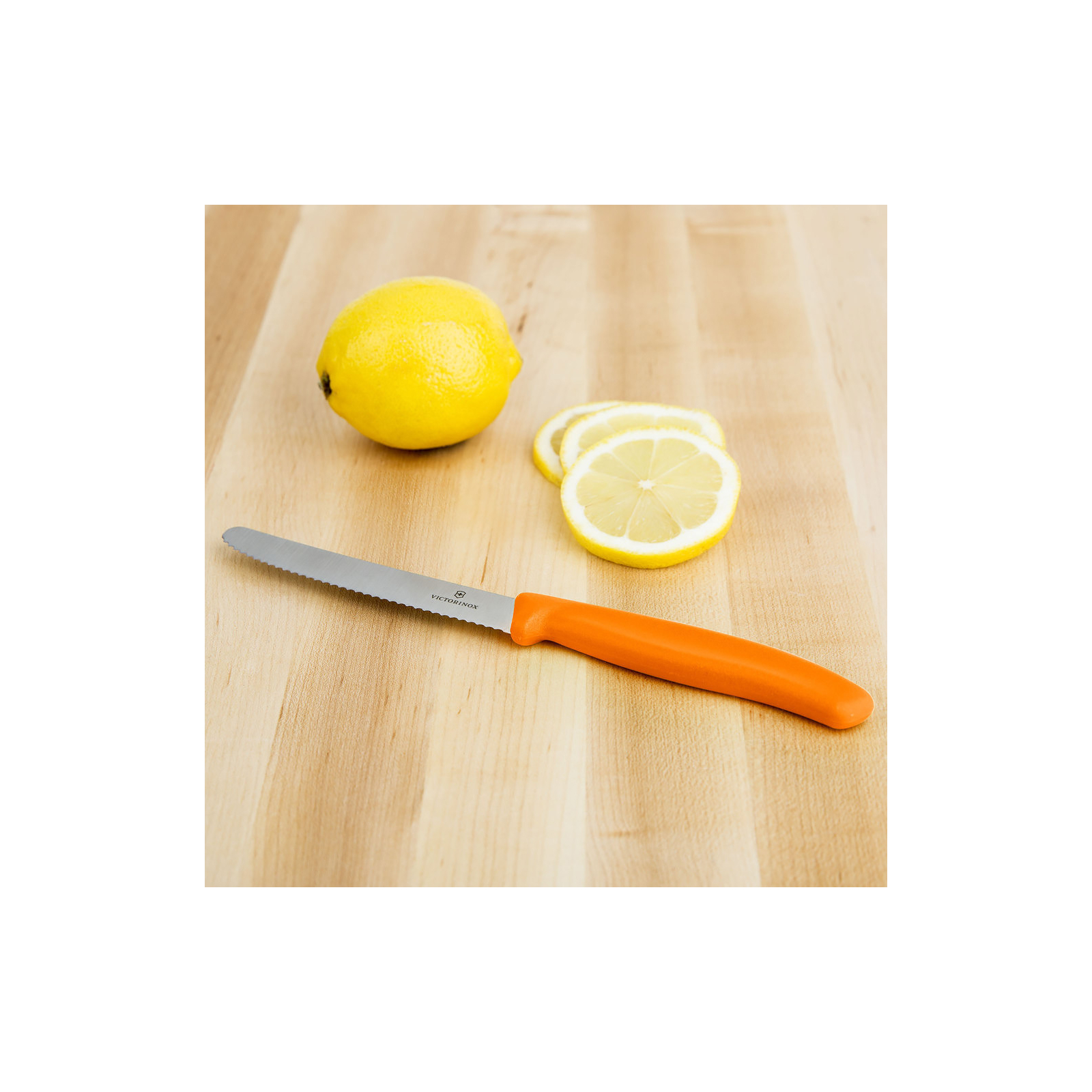 Кухонный нож Victorinox SwissClassic для овощей 11 см, волнистое лезвие, оранжевый (6.7836.L119) изображение 2