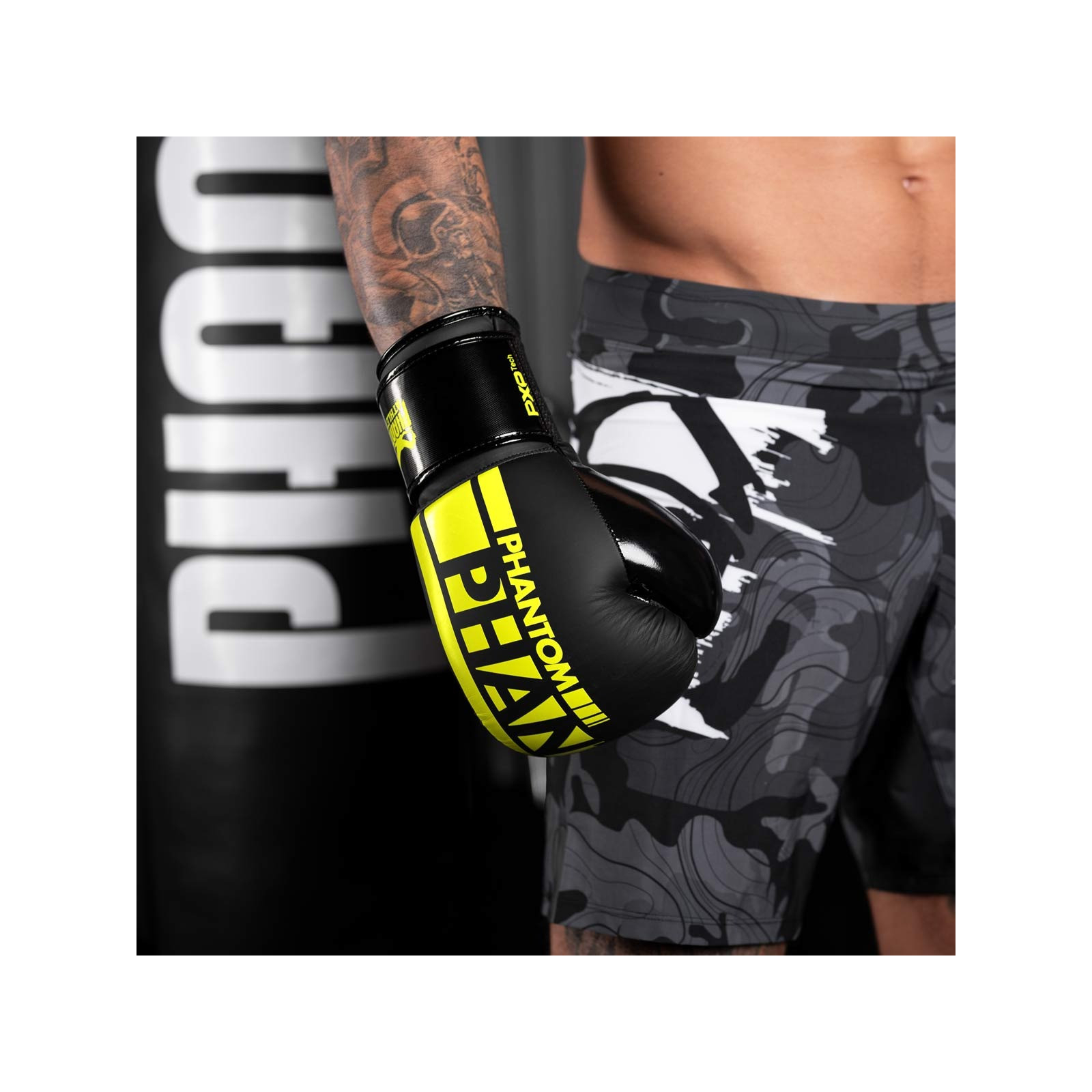 Боксерские перчатки Phantom APEX Elastic Neon Black/Yellow 12oz (PHBG2300-12) изображение 9