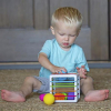 Розвиваюча іграшка Fat Brain Toys Куб-сортер зі стінками-шнурочками InnyBin (F251ML) зображення 7