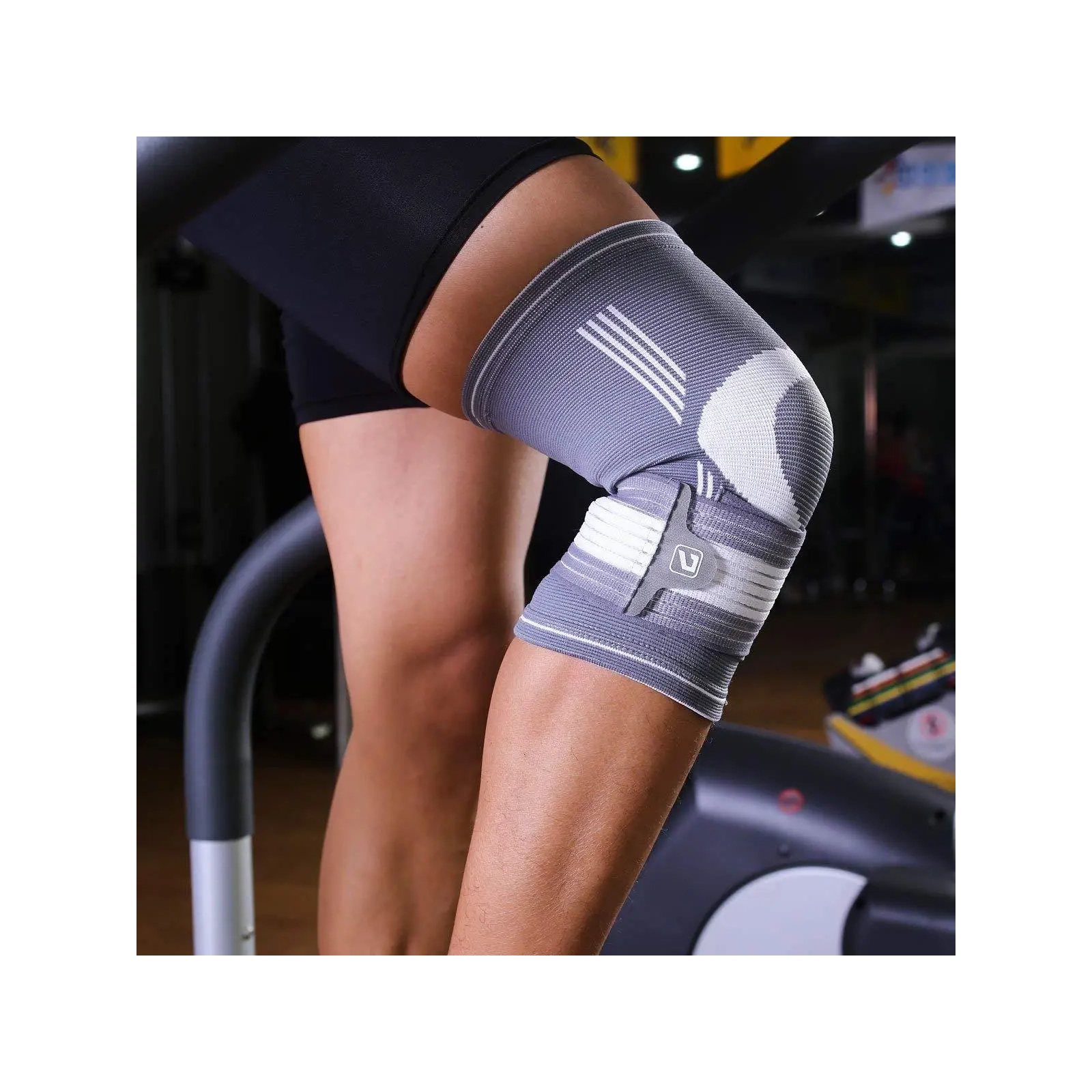 Фиксатор колена LiveUp Knee Support LS5676-S сірий, білий Уні S (6951376182316) изображение 3