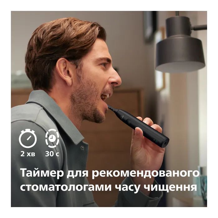 Електрична зубна щітка Philips HX7101/01 зображення 8