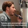 Електрична зубна щітка Philips HX7101/01 зображення 8
