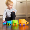 Розвиваюча іграшка Fat Brain Toys Пірамідка на колесах Їжачки Hiding Hedgehogs (F223ML) зображення 6