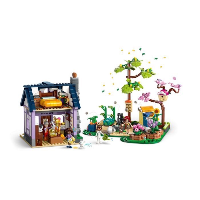 Конструктор LEGO Friends Будиночок і квітник бджолярів (42669) зображення 3