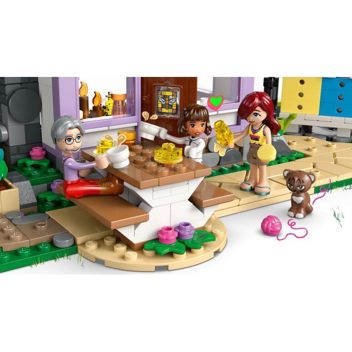 Конструктор LEGO Friends Будиночок і квітник бджолярів (42669) зображення 5