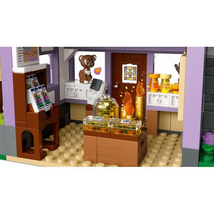 Конструктор LEGO Friends Будиночок і квітник бджолярів (42669) зображення 6